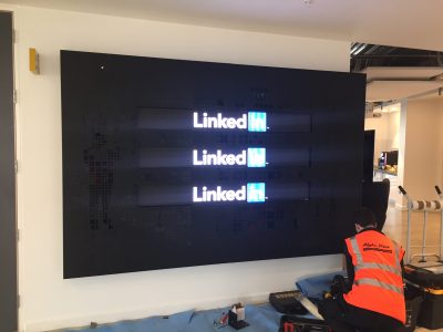 LED Signs Embedded into the glass wall